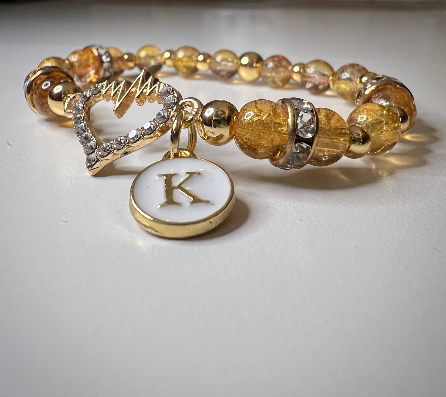 Double loop heartbeat w/ letter charm