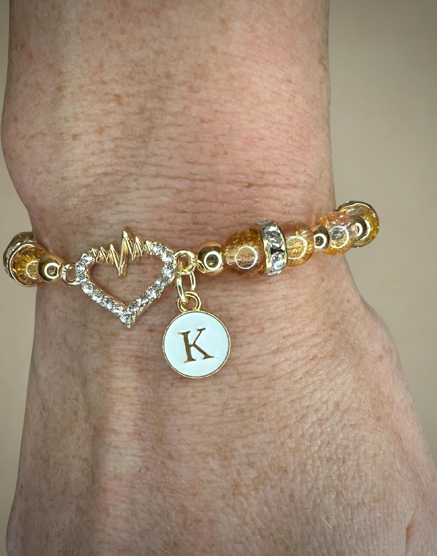 Double loop heartbeat w/ letter charm